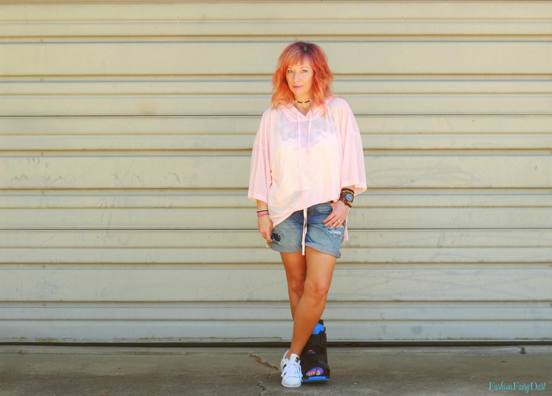 Mesh pink hoodie, JORD watch and Adidas.