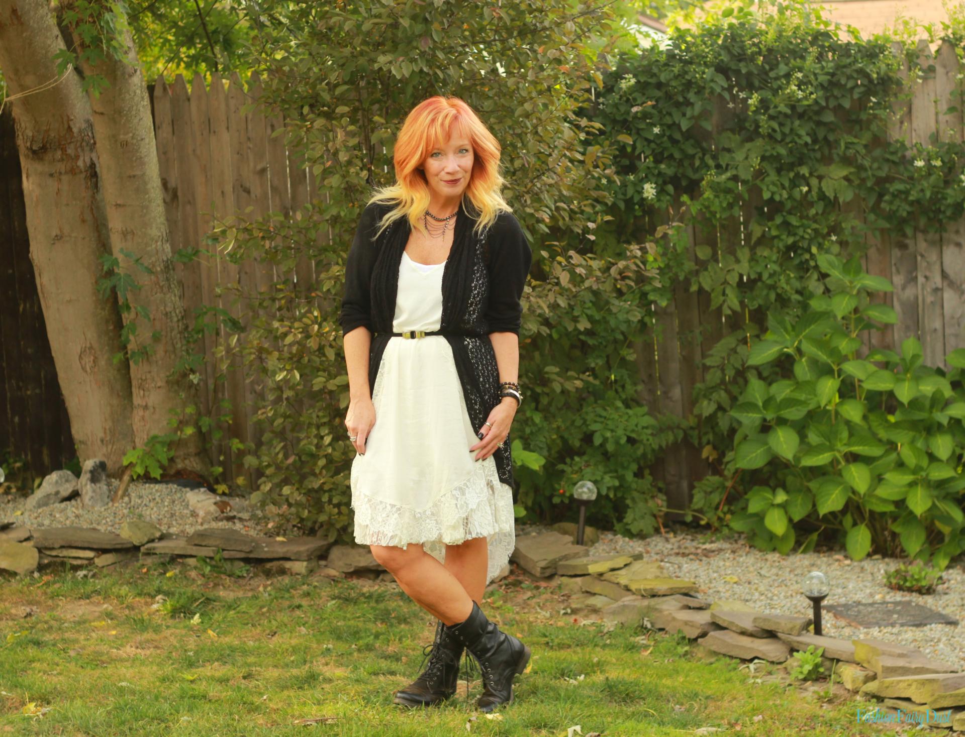 White slip dress, combat boots and black cardigan.